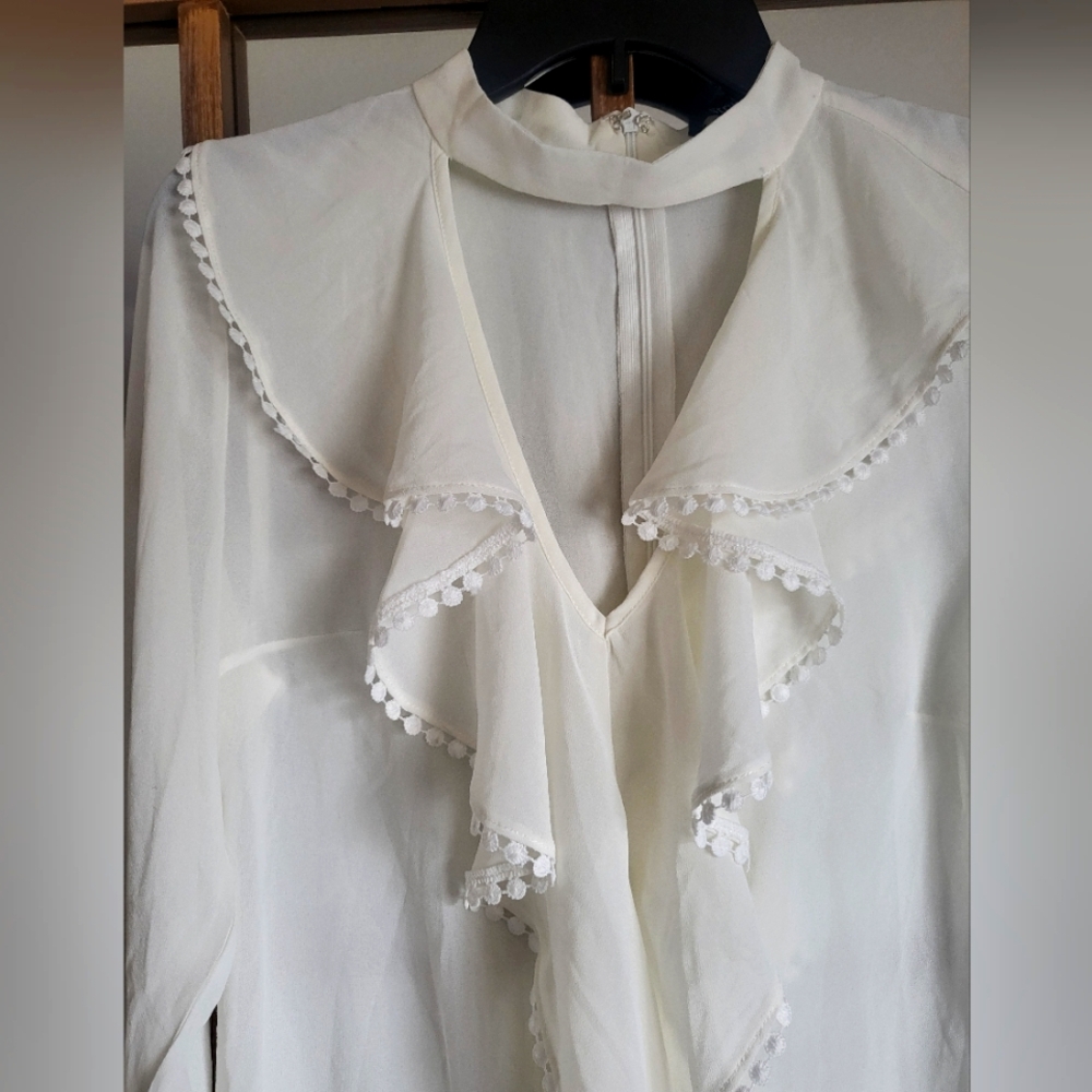Elegant White Ruffled Blouse